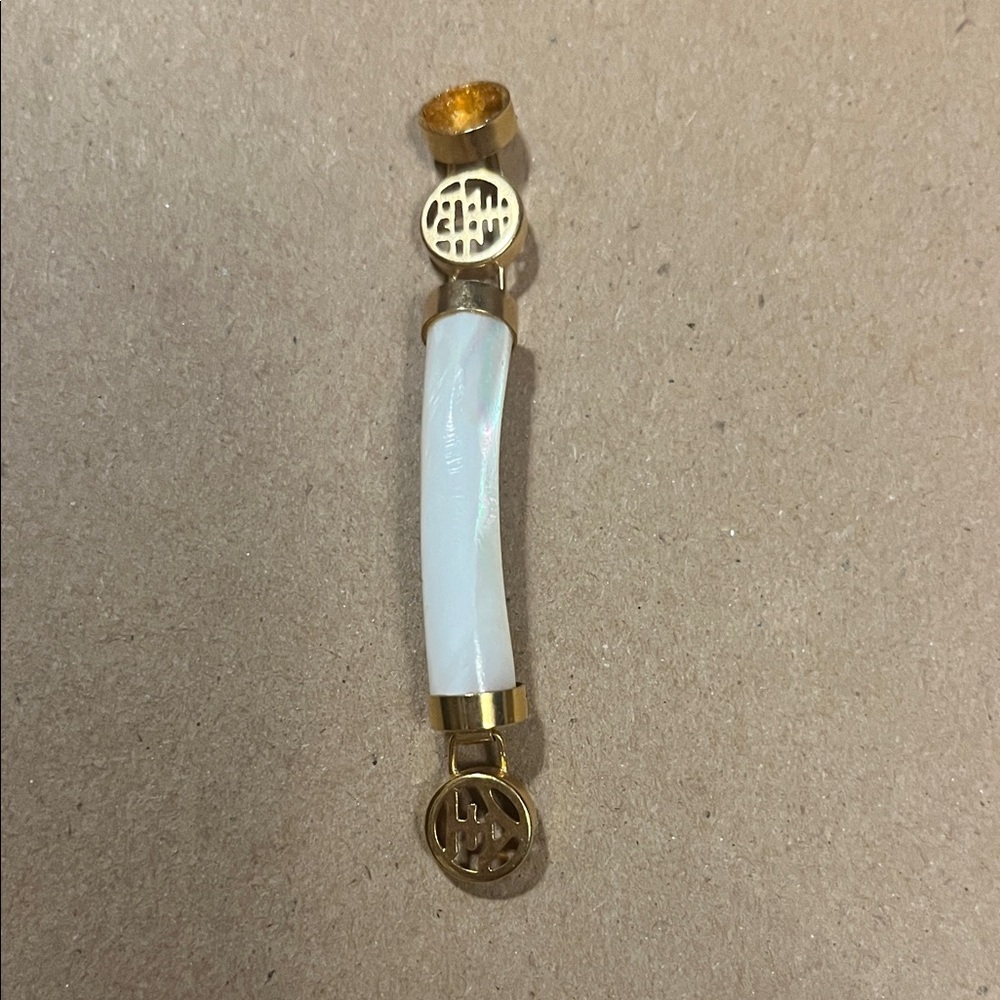 Gold and White Decorative Handle